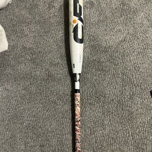 White and Black Baseball Bat